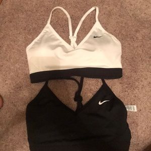 Black and white Nike sports bras